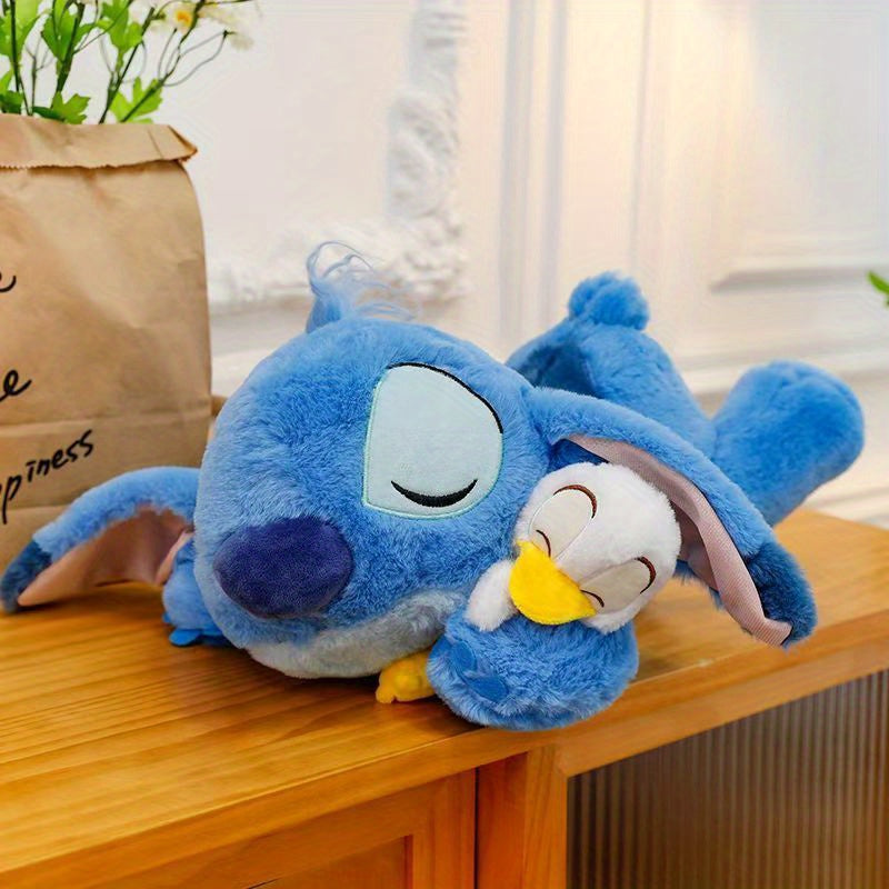 Jouet en Peluche Stitch avec Canard - Animal en Peluche Doux de Couleur Bleue dans une Position d'Étreinte, Coussin Officiellement Licencié pour Enfants, Filles, Femmes, Cadeau d'Anniversaire, Peluches Rembourrées