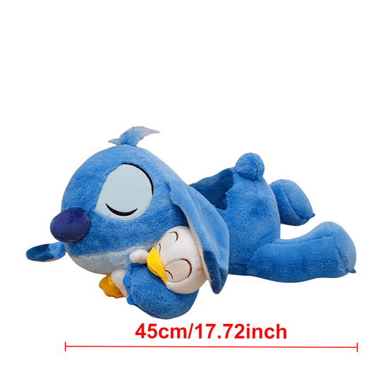 Jouet en Peluche Stitch avec Canard - Animal en Peluche Doux de Couleur Bleue dans une Position d'Étreinte, Coussin Officiellement Licencié pour Enfants, Filles, Femmes, Cadeau d'Anniversaire, Peluches Rembourrées