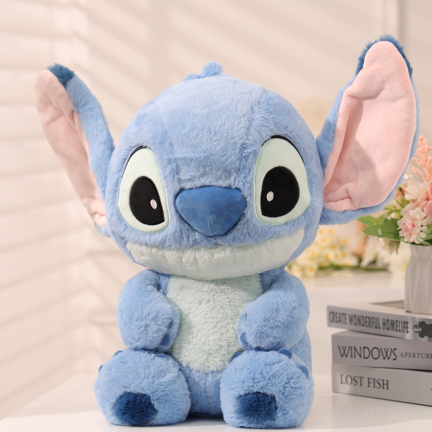Disney Poupée Assise de la Série Basique Stitch, Cadeau d'Anniversaire Mignon et Doux en Peluche Disponible dans Diverses Tailles